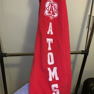 Wide legged red sweat pants “Atoms”